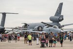 Visitors look at static aircraft displays during the Joint Base San Antonio Air Show and Open House Oct. 31, 2015, at JBSA-Randolph, Texas. In addition to static aircraft displays the air show featured aerial demonstrations of  World War II fighters and bombers, the Thunderbirds and gave visitors the chance to meet and interact with today’s Airmen.
