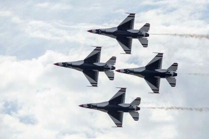 JBSA-Randolph - The U.S. Air Force Aerial Demonstration Squadron “Thunderbirds” performs F-16 acrobatic maneuvers Oct. 31, 2015 at Joint Base San Antonio-Randolph, Texas. The Thunderbirds team members perform for the 2015 JBSA-Randolph Air Show and Open House to be held Oct. 31 and Nov. 1. Air shows allow the Air Force to display the capabilities of our aircraft to the American taxpayer through aerial demonstrations and static displays and allowing attendees to get up close and personal to see some of the equipment and aircraft used by the U.S. military today. (U.S. Air Force photo by Joshua Rodriguez) 
