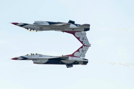 JBSA-Randolph - The U.S. Air Force Aerial Demonstration Squadron “Thunderbirds” performs F-16 acrobatic maneuvers Oct. 31, 2015 at Joint Base San Antonio-Randolph, Texas. The Thunderbirds team members perform for the 2015 JBSA-Randolph Air Show and Open House to be held Oct. 31 and Nov. 1. Air shows allow the Air Force to display the capabilities of our aircraft to the American taxpayer through aerial demonstrations and static displays and allowing attendees to get up close and personal to see some of the equipment and aircraft used by the U.S. military today. (U.S. Air Force photo by Joshua Rodriguez) 