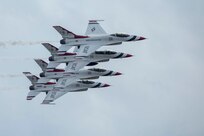 JBSA-Randolph - The U.S. Air Force Aerial Demonstration Squadron “Thunderbirds” performs F-16 acrobatic maneuvers Oct. 31, 2015 at Joint Base San Antonio-Randolph, Texas. The Thunderbirds team members perform for the 2015 JBSA-Randolph Air Show and Open House to be held Oct. 31 and Nov. 1. Air shows allow the Air Force to display the capabilities of our aircraft to the American taxpayer through aerial demonstrations and static displays and allowing attendees to get up close and personal to see some of the equipment and aircraft used by the U.S. military today. (U.S. Air Force photo by Joshua Rodriguez) 
