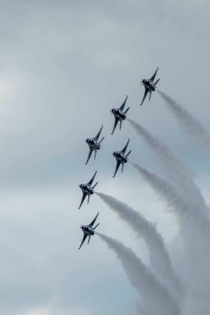 JBSA-Randolph - The U.S. Air Force Aerial Demonstration Squadron “Thunderbirds” performs F-16 acrobatic maneuvers Oct. 31, 2015 at Joint Base San Antonio-Randolph, Texas. The Thunderbirds team members perform for the 2015 JBSA-Randolph Air Show and Open House to be held Oct. 31 and Nov. 1. Air shows allow the Air Force to display the capabilities of our aircraft to the American taxpayer through aerial demonstrations and static displays and allowing attendees to get up close and personal to see some of the equipment and aircraft used by the U.S. military today. (U.S. Air Force photo by Joshua Rodriguez) 
