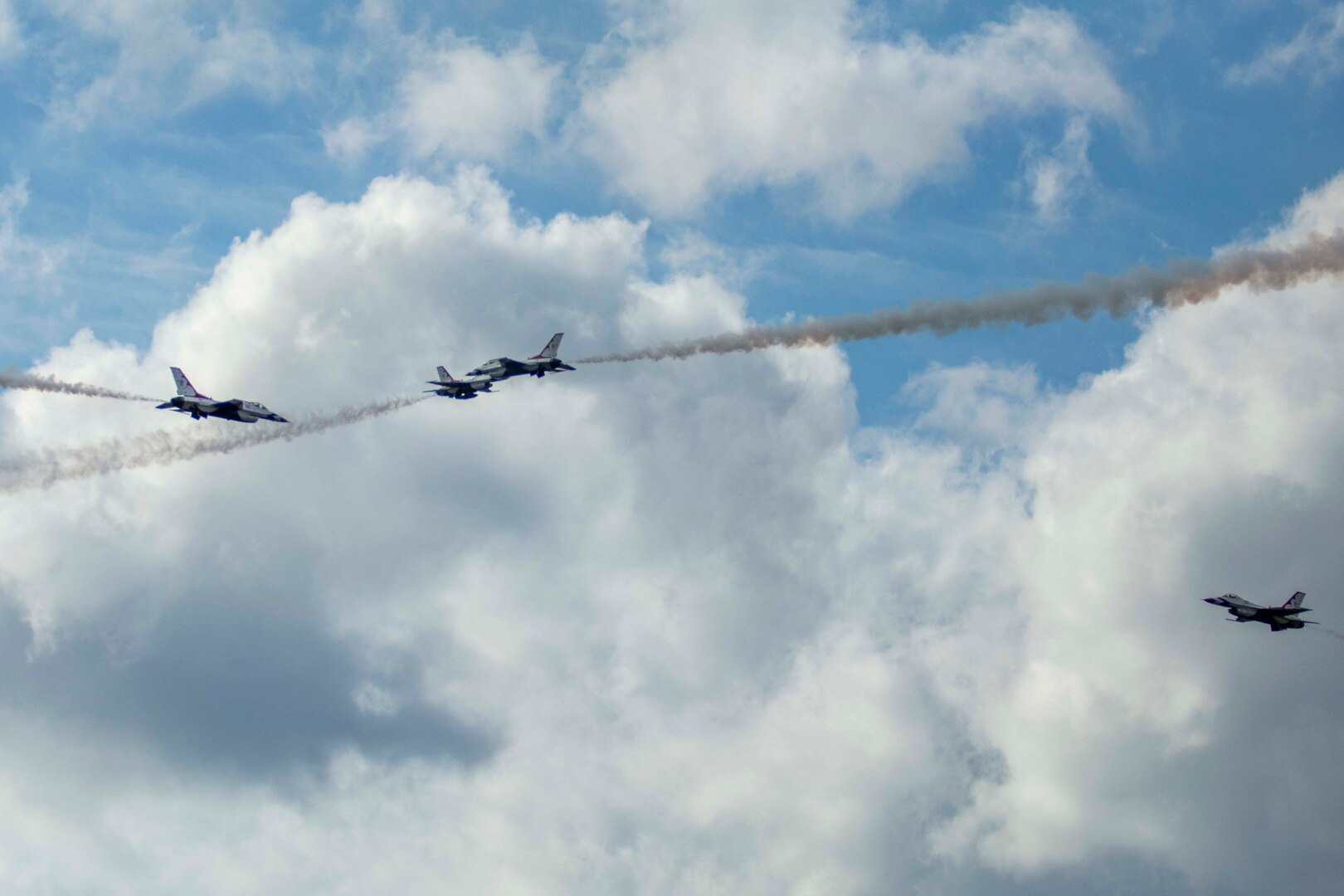 JBSA-Randolph - The U.S. Air Force Aerial Demonstration Squadron “Thunderbirds” performs F-16 acrobatic maneuvers Oct. 31, 2015 at Joint Base San Antonio-Randolph, Texas. The Thunderbirds team members perform for the 2015 JBSA-Randolph Air Show and Open House to be held Oct. 31 and Nov. 1. Air shows allow the Air Force to display the capabilities of our aircraft to the American taxpayer through aerial demonstrations and static displays and allowing attendees to get up close and personal to see some of the equipment and aircraft used by the U.S. military today. (U.S. Air Force photo by Joshua Rodriguez) 