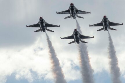 JBSA-Randolph - The U.S. Air Force Aerial Demonstration Squadron “Thunderbirds” performs F-16 acrobatic maneuvers Oct. 31, 2015 at Joint Base San Antonio-Randolph, Texas. The Thunderbirds team members perform for the 2015 JBSA-Randolph Air Show and Open House to be held Oct. 31 and Nov. 1. Air shows allow the Air Force to display the capabilities of our aircraft to the American taxpayer through aerial demonstrations and static displays and allowing attendees to get up close and personal to see some of the equipment and aircraft used by the U.S. military today. (U.S. Air Force photo by Joshua Rodriguez) 