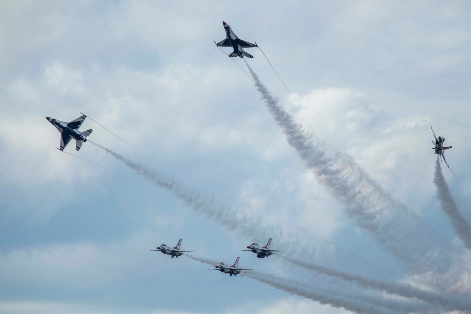 JBSA-Randolph - The U.S. Air Force Aerial Demonstration Squadron “Thunderbirds” performs F-16 acrobatic maneuvers Oct. 31, 2015 at Joint Base San Antonio-Randolph, Texas. The Thunderbirds team members perform for the 2015 JBSA-Randolph Air Show and Open House to be held Oct. 31 and Nov. 1. Air shows allow the Air Force to display the capabilities of our aircraft to the American taxpayer through aerial demonstrations and static displays and allowing attendees to get up close and personal to see some of the equipment and aircraft used by the U.S. military today. (U.S. Air Force photo by Joshua Rodriguez) 