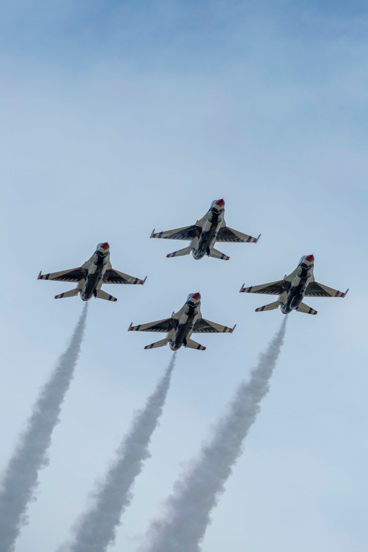 JBSA-Randolph - The U.S. Air Force Aerial Demonstration Squadron “Thunderbirds” performs F-16 acrobatic maneuvers Oct. 31, 2015 at Joint Base San Antonio-Randolph, Texas. The Thunderbirds team members perform for the 2015 JBSA-Randolph Air Show and Open House to be held Oct. 31 and Nov. 1. Air shows allow the Air Force to display the capabilities of our aircraft to the American taxpayer through aerial demonstrations and static displays and allowing attendees to get up close and personal to see some of the equipment and aircraft used by the U.S. military today. (U.S. Air Force photo by Joshua Rodriguez) 