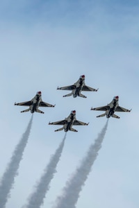 JBSA-Randolph - The U.S. Air Force Aerial Demonstration Squadron “Thunderbirds” performs F-16 acrobatic maneuvers Oct. 31, 2015 at Joint Base San Antonio-Randolph, Texas. The Thunderbirds team members perform for the 2015 JBSA-Randolph Air Show and Open House to be held Oct. 31 and Nov. 1. Air shows allow the Air Force to display the capabilities of our aircraft to the American taxpayer through aerial demonstrations and static displays and allowing attendees to get up close and personal to see some of the equipment and aircraft used by the U.S. military today. (U.S. Air Force photo by Joshua Rodriguez) 