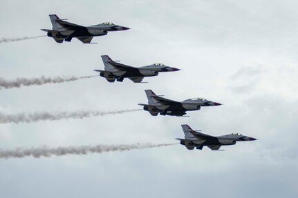 JBSA-Randolph - The U.S. Air Force Aerial Demonstration Squadron “Thunderbirds” performs F-16 acrobatic maneuvers Oct. 31, 2015 at Joint Base San Antonio-Randolph, Texas. The Thunderbirds team members perform for the 2015 JBSA-Randolph Air Show and Open House to be held Oct. 31 and Nov. 1. Air shows allow the Air Force to display the capabilities of our aircraft to the American taxpayer through aerial demonstrations and static displays and allowing attendees to get up close and personal to see some of the equipment and aircraft used by the U.S. military today. (U.S. Air Force photo by Joshua Rodriguez) 