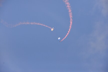 The U.S. Air Force Wings of Blue perform during the 2015 Air Show and Open House at Joint Base San Antonio-Randolph Oct. 31, 2015. The Wings of Blue has both a demonstration team and a competition team. The demonstration team travels across the country to airshows, sporting events, and other venues to represent the Air Force in precision parachuting.  (U.S. Air Force photo by Olivia Mendoza/released)
