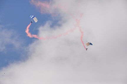 The U.S. Air Force Wings of Blue perform during the 2015 Air Show and Open House at Joint Base San Antonio-Randolph Oct. 31, 2015. The Wings of Blue has both a demonstration team and a competition team. The demonstration team travels across the country to airshows, sporting events, and other venues to represent the Air Force in precision parachuting.  (U.S. Air Force photo by Olivia Mendoza/released)
