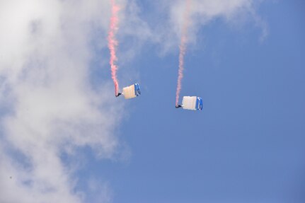 The U.S. Air Force Wings of Blue perform during the 2015 Air Show and Open House at Joint Base San Antonio-Randolph Oct. 31, 2015. The Wings of Blue has both a demonstration team and a competition team. The demonstration team travels across the country to airshows, sporting events, and other venues to represent the Air Force in precision parachuting.  (U.S. Air Force photo by Olivia Mendoza/released)

