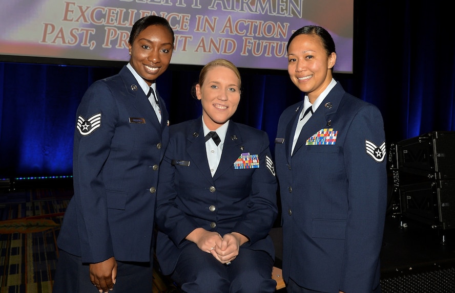 (From Left) Staff Sgts. Amber Fredericks, Taylor Savage and Maria Szymanski, combat medics, pose for a group photo during the 47th Annual Airlift Tanker Association Convention and Technology Exposition and A/TA and AMC Symposium in Orlando, Fla., Oct. 31, 2015. The medics were reunited at this year’s closing keynote address. (U.S. Air Force photo by Staff Sgt. Shandresha Mitchell/Released)