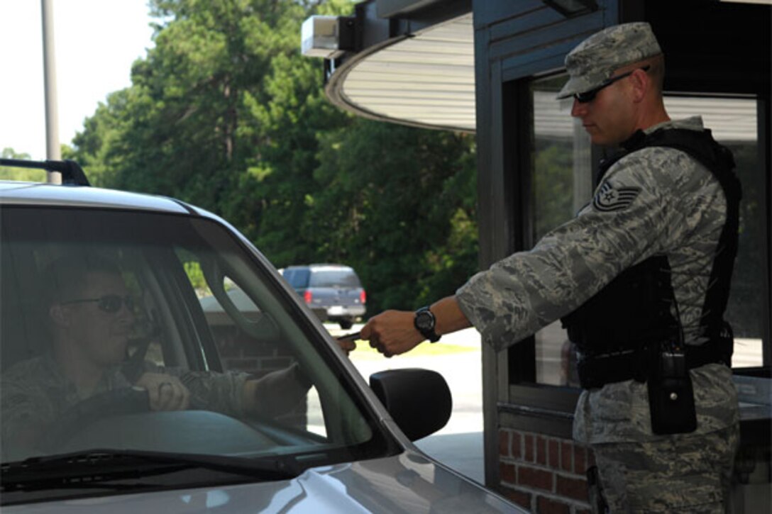 The 628th Security Forces Squadron, here, recently published a memo to clarify and standardize its policy for gate entry of Department of Defense ID cardholders who are entering the base and escorting non-DoD affiliated visitors/guests utilizing the Trusted Traveler Policy. (U.S. Air Force Photo)