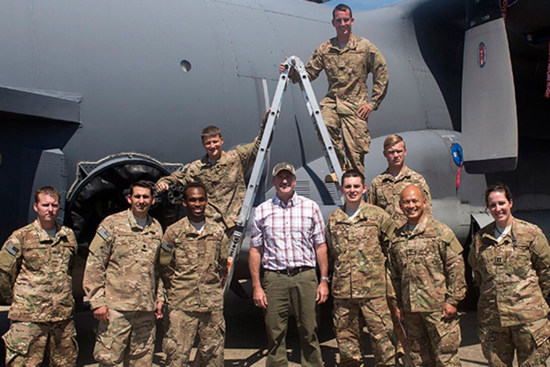 Ryan Moss, CEO of Little Giant Ladders, visits airmen from the Air Force Special Operations Command at Hurlburt Field, Fla., Aug. 26, 2015, as they discuss how they use his company’s ladders on a daily basis. 