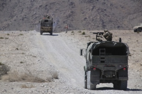 Marines with Combat Logistics Battalion 1, Combat Logistics Regiment 1, 1st Marine Logistics Group, fire on targets with M240 medium machine guns during a mounted patrol exercise aboard Marine Corps Air Ground Combat Center Twentynine Palms, California, Aug. 10, 2015. Marines faced numerous challenges during the training including simulated ambushes, improvised explosive device attacks and casualty evacuations.