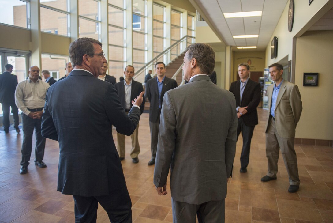 Defense Ash Carter speaks withe Defense Innovation Unit -Experimental staff members during a visit to Moffett Field, Calif., Aug. 28, 2015. DoD photo by U.S. Air Force Master Sgt. Adrian Cadiz