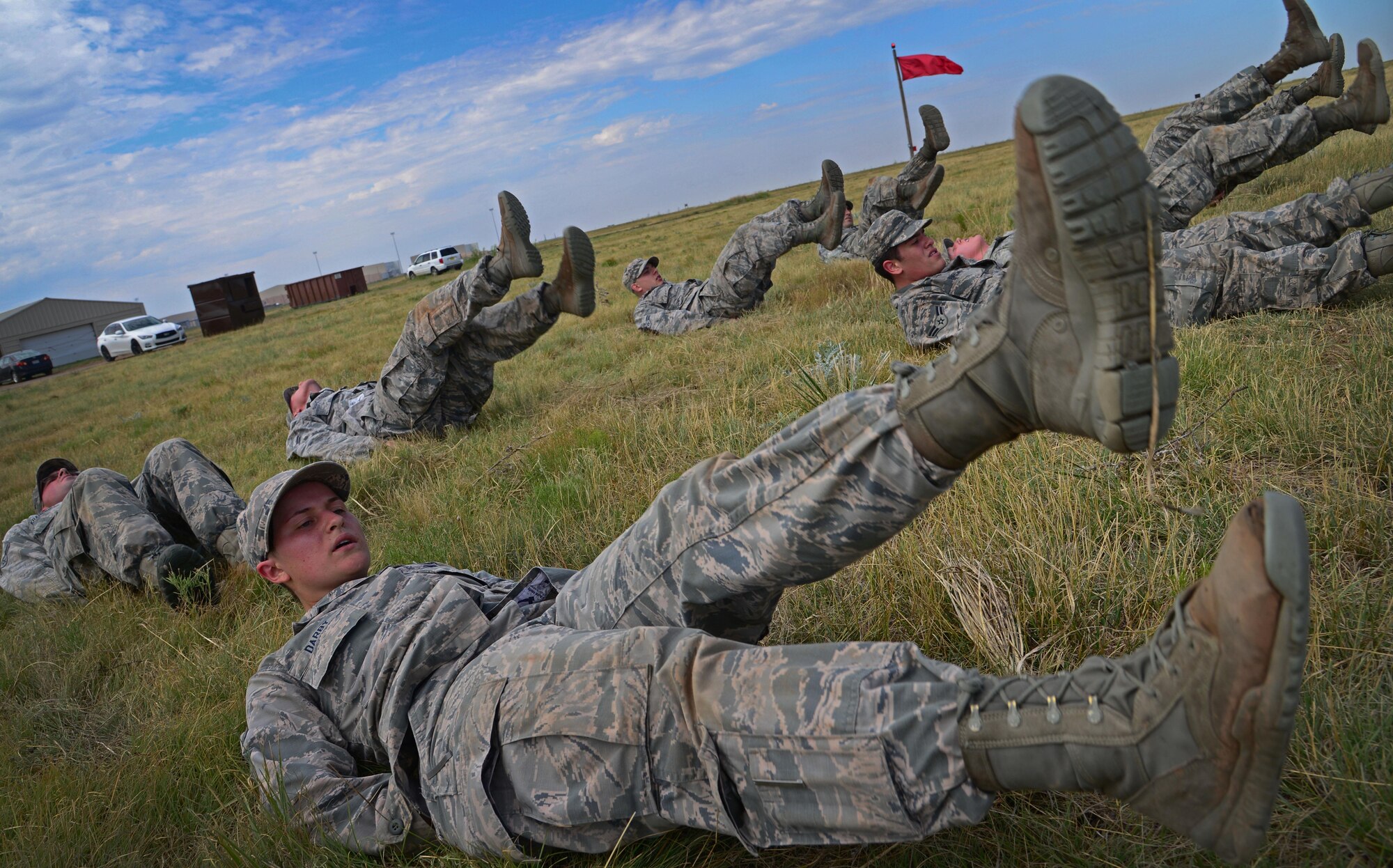 Members of the 27th Special Operations Security Forces Squadron push themselves through physical testing as part of pre-qualification for Deployed Aircraft Ground Response Element selection Aug. 17, 2015 at Cannon Air Force Base, N.M. The DAGRE training program at Cannon has recreated a very rigorous training environment to test and develop Air Commandos who have DAGRE team member aspirations. (U.S. Air Force photo/Staff Sgt. Alexx Mercer)
