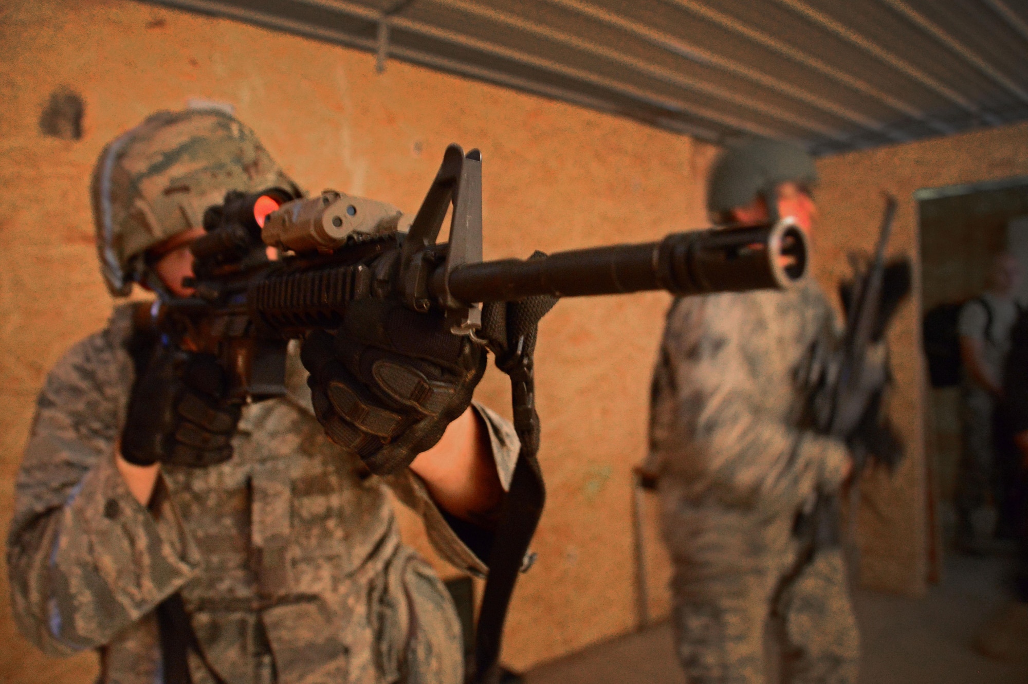 A member of the 27th Special Operations Security Forces Squadron readies their weapon as part of pre-qualification for Deployed Aircraft Ground Response Element selection Aug. 17, 2015 at Cannon Air Force Base, N.M. The DAGRE training program at Cannon has recreated a very rigorous training environment to test and develop Air Commandos who have DAGRE team member aspirations. (U.S. Air Force photo/ Staff Sgt. Alexx Mercer)