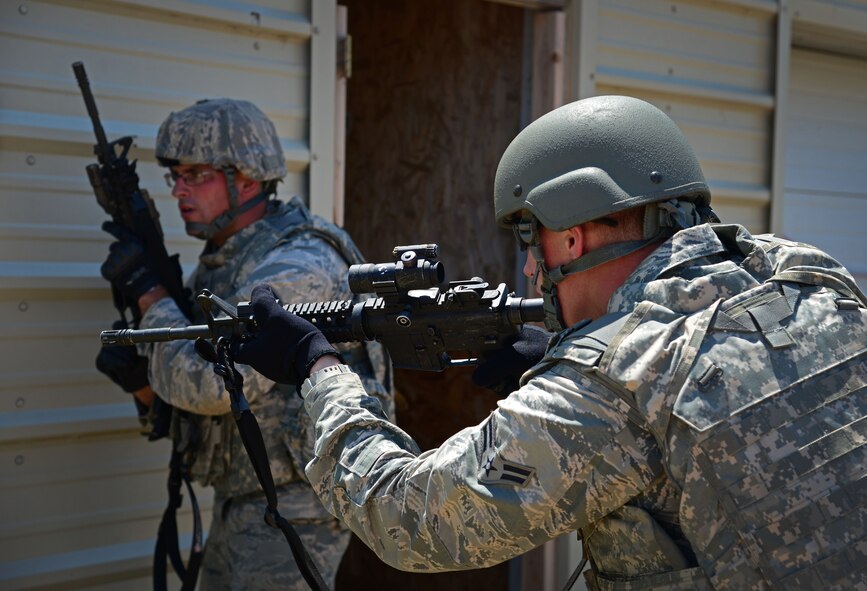 Members of the 27th Special Operations Security Forces Squadron practice tactics as part of pre-qualification for Deployed Aircraft Ground Response Element selection Aug. 17, 2015 at Cannon Air Force Base, N.M. The DAGRE training program at Cannon has recreated a very rigorous training environment to test and develop Air Commandos who have DAGRE team member aspirations. (U.S. Air Force photo/Staff Sgt. Alexx Mercer)