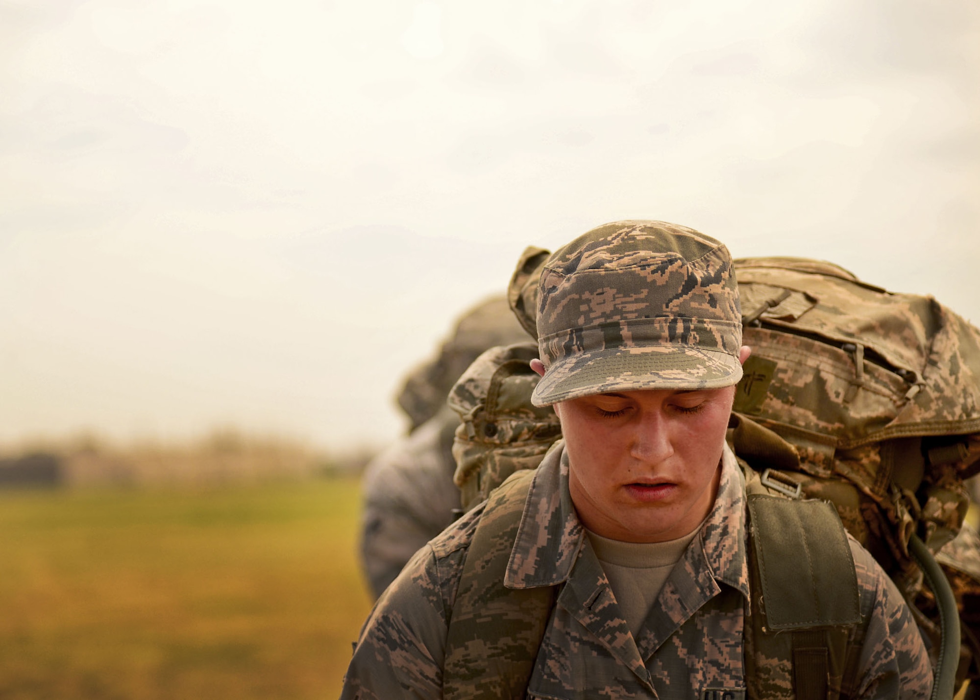 A member of the 27th Special Operations Security Forces Squadron collects herself during a grueling physical, mental and emotional assessment as part of pre-qualification for Deployed Aircraft Ground Response Element selection Aug. 17, 2015 at Cannon Air Force Base, N.M. The DAGRE training program at Cannon has recreated a very rigorous training environment to test and develop Air Commandos who have DAGRE team member aspirations. (U.S. Air Force photo/Senior Airman Chip Slack)