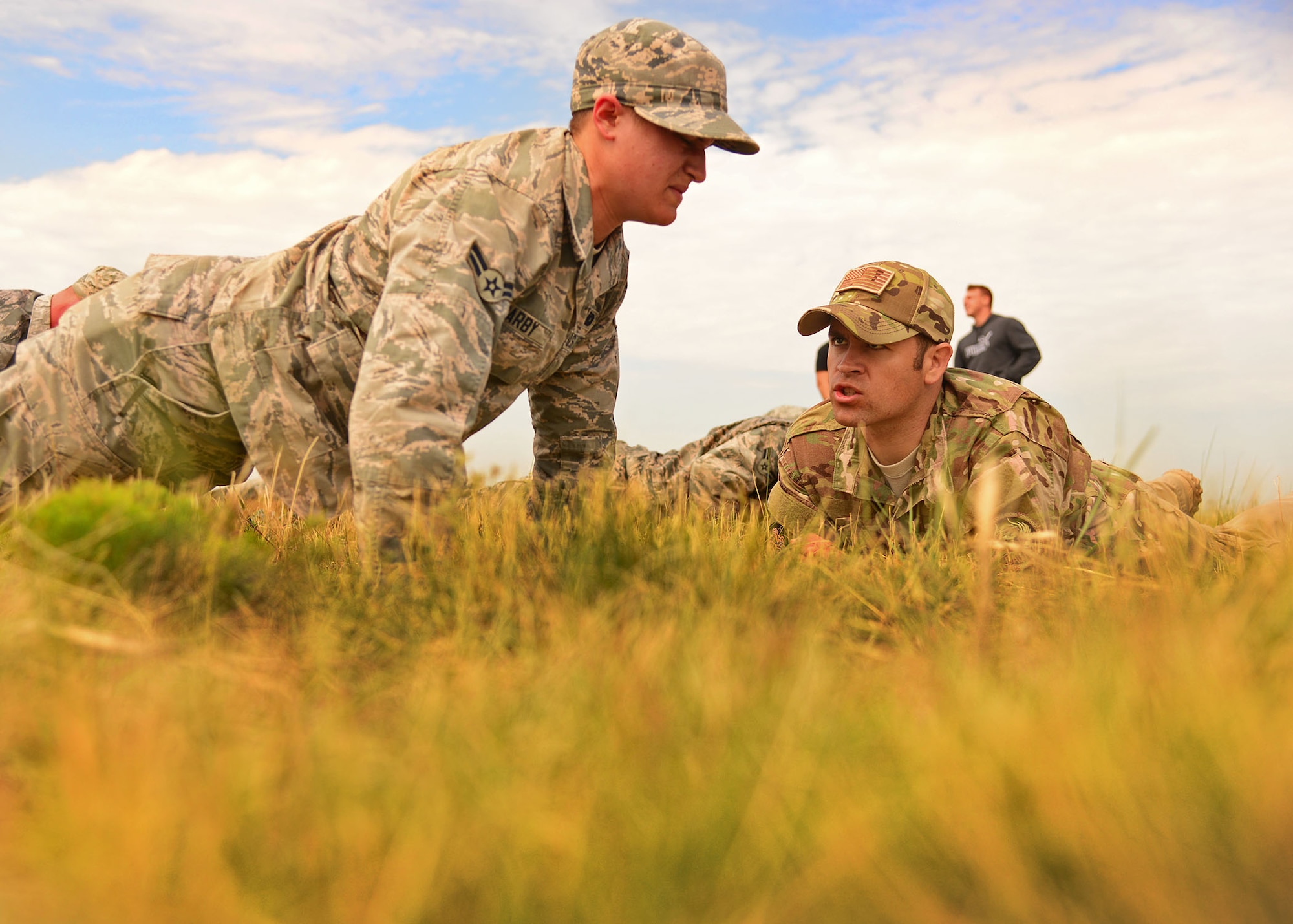 A member of the 27th Special Operations Security Forces Squadron is verbally challenged by Tech. Sgt. Brian Cikity (DAGRE 199), 27th SOSFS DAGRE Program Manager, during a grueling physical, mental and emotional assessment as part of pre-qualification for Deployed Aircraft Ground Response Element selection Aug. 17, 2015 at Cannon Air Force Base, N.M. The DAGRE training program at Cannon has recreated a very rigorous training environment to test and develop Air Commandos who have DAGRE team member aspirations. (U.S. Air Force photo/Senior Airman Chip Slack)