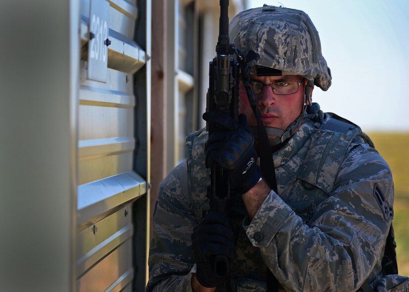 A member of the 27th Special Operations Security Forces Squadron practices building clearing as part of pre-qualification for Deployed Aircraft Ground Response Element selection Aug. 17, 2015 at Cannon Air Force Base, N.M. The DAGRE training program at Cannon has recreated a very rigorous training environment to test and develop Air Commandos who have DAGRE team member aspirations. (U.S. Air Force photo/Senior Airman Chip Slack)