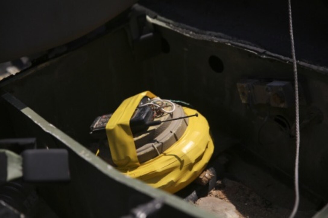 The Marines with Combat Logistics Battalion 1, Combat Logistics Regiment 1, discovered a simulated improvised explosive device in a tactical vehicle during their training at Large Scale Exercise 15 aboard Marine Corps Air Ground Combat Center Twentynine Palms, Calif., Aug. 18, 2015. LSE-15 is a combined U.S. Marine Corps, Canadian and British exercise conducted at the brigade level, designed to enable live, virtual and constructive training for participating forces. (U.S. Marine Corps photo by Lance Cpl. Chris Garcia/Released)
