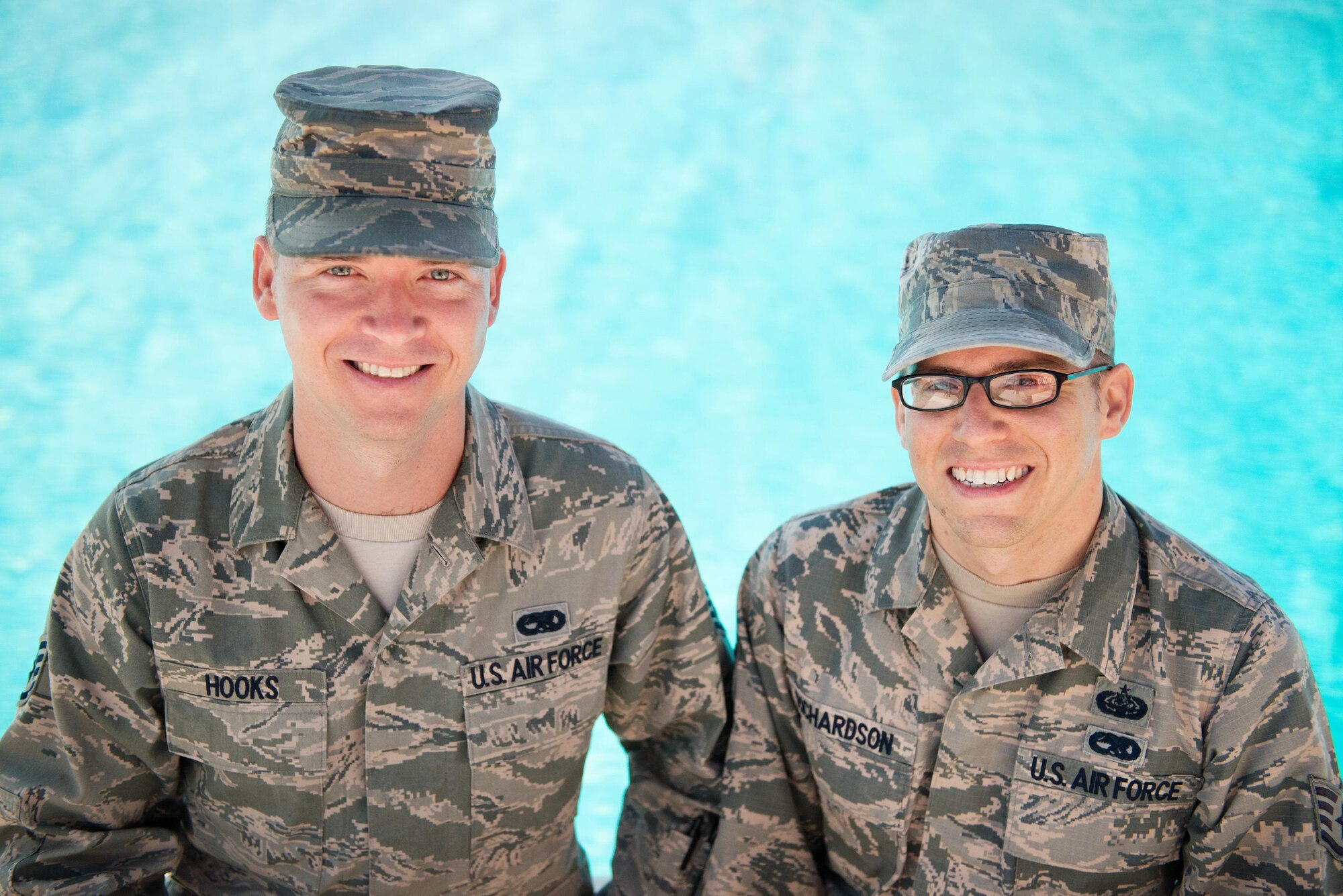 Staff Sgt. Edgar Hooks, a 60th Maintenance Squadron avionics specialist, and Staff Sgt. Sean Richardson, the 821st Contingency Response Support Squadron transmission systems supervisor, used their Air Force training to save the life of a 6-year-old boy who was drowning in a friend's pool. Richardson pulled the unconscious child from the bottom of a 10-feet-deep pool and Hooks resuscitated the boy by performing CPR. (U.S. Air Force photo/Ken Wright)