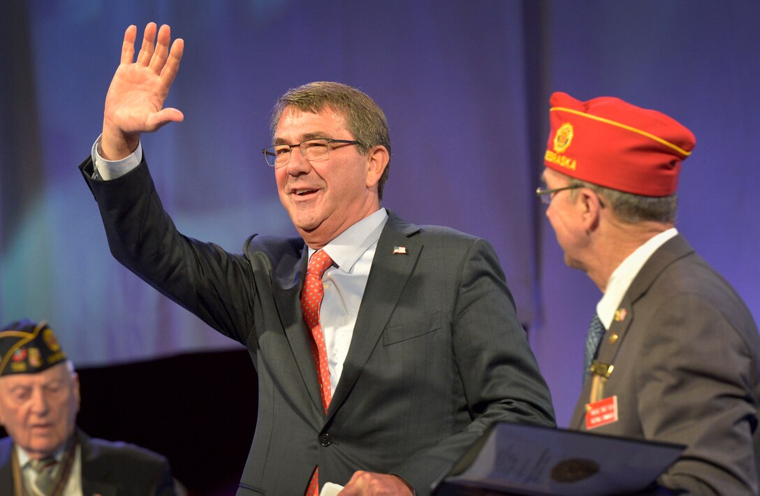 Defense Secretary Ash Carter waves to attendees of the American Legion Convention while delivering remarks in Baltimore, Sept. 1, 2015. DoD Photo by Glenn Fawcett