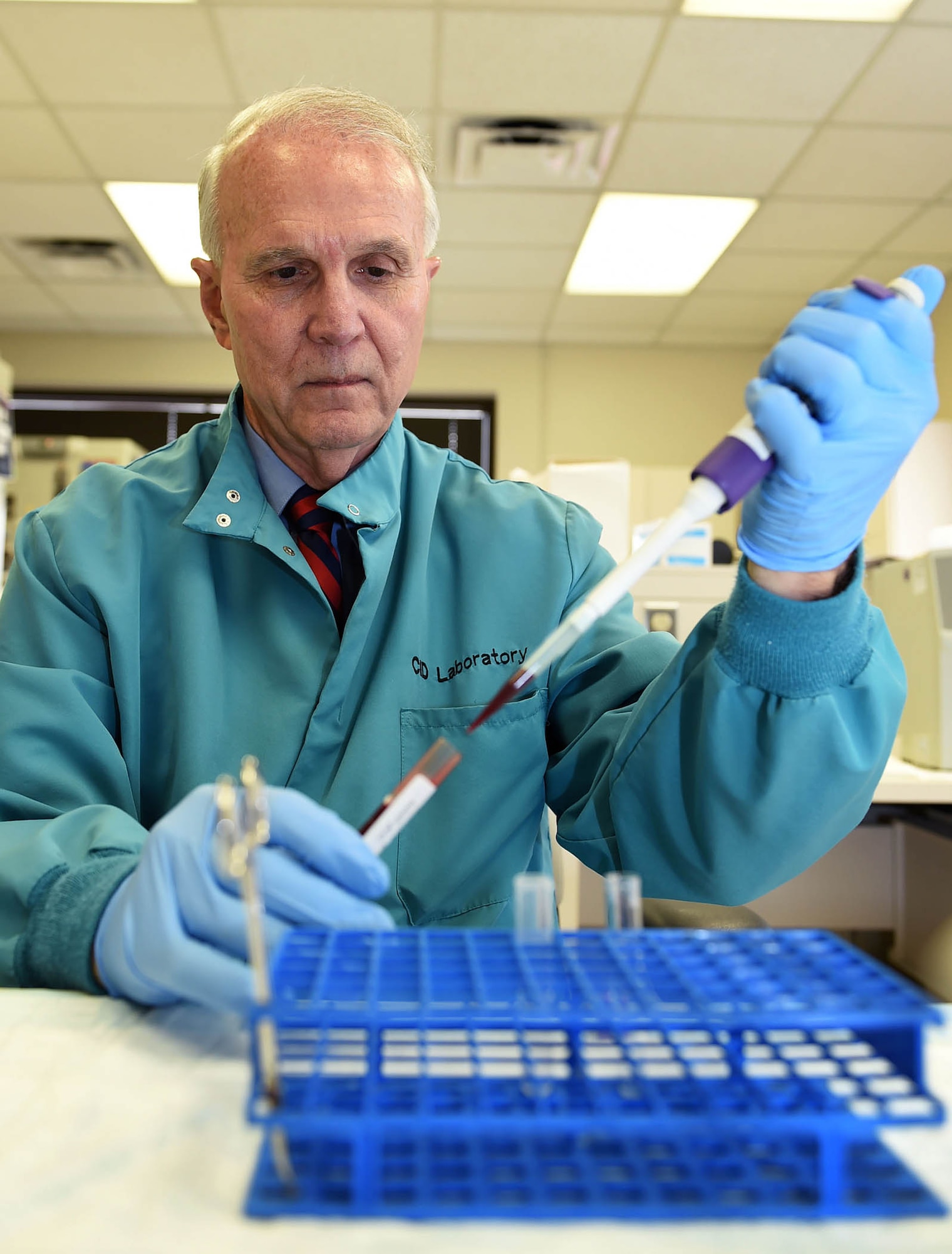 Clinical research scientist David McGlasson pipets a blood sample for analysis Aug. 18, 2015 at the 59th Medical Wing’s Clinical Research Division facility on Joint Base San Antonio-Lackland, Texas. McGlasson recently received the American Society for Clinical Laboratory Science’s Scientific Researcher of the Year Award for 2015, his eighth win since 2002. (U.S. Air Force photo by Staff Sgt. Jerilyn Quintanilla) 
