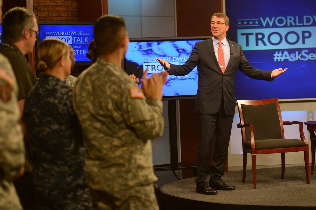 Defense Secretary Ash Carter greets the audience as he takes the stage at the Defense Media Activity studio on Fort Meade, Md., Sept. 1, 2015. DoD photo by Marvin Lynchard