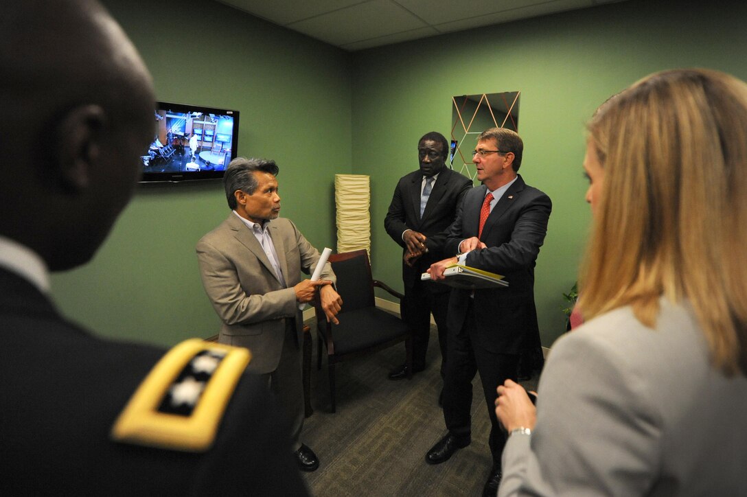Defense Media Activity Program Director Brian Kumia and Director Ray B. Shepherd brief Defense Secretary Ash Carter in the green room before his studio appearance for the Worldwide Troop Talk on Fort Meade, Sept. 1, 2015. DoD Photo by Marvin Lynchard