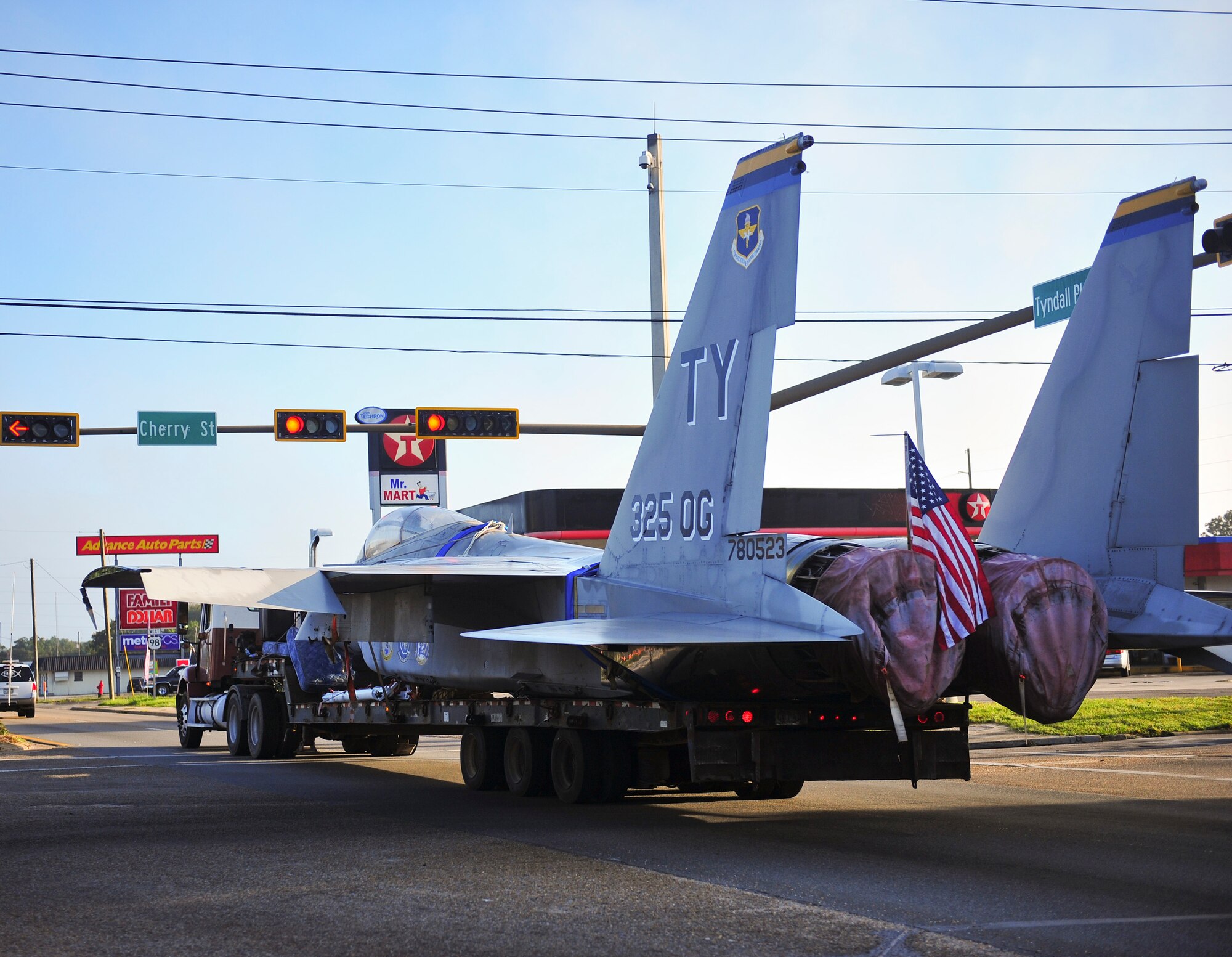 An F-15C Eagle is transported down the Highway 98 in Panama City, Fla. 30 Aug. The F-15 was transported to Haney Technical Center to be used to train future aircraft mechanics in their Aviation Academy. (U.S. Air Force photo by Airman 1st Class Dustin Mullen/Released)