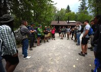 Attendees of a Single Airmen’s Retreat receive a safety briefing before hiking in Glacier National Park, Mont., Aug. 29, 2015. During the retreat, Airmen learned how to start and sustain healthy dating relationships while exploring some of Montana’s best outdoor attractions.  (U.S. Air Force photo/Airman 1st Class Collin Schmidt) 