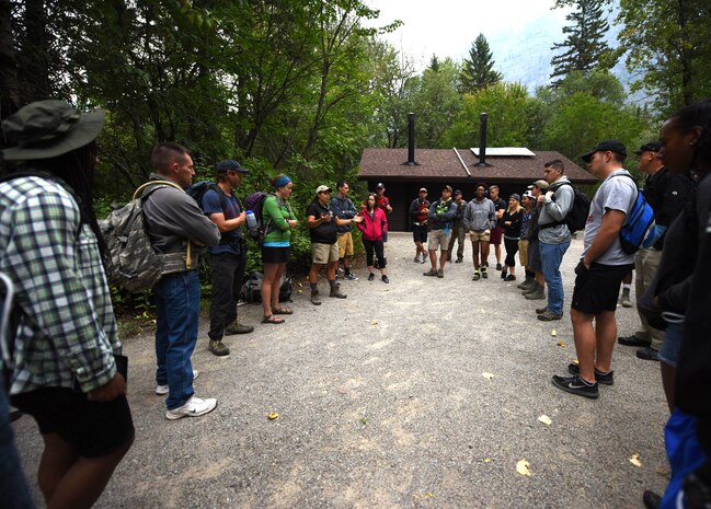 Attendees of a Single Airmen’s Retreat receive a safety briefing before hiking in Glacier National Park, Mont., Aug. 29, 2015. During the retreat, Airmen learned how to start and sustain healthy dating relationships while exploring some of Montana’s best outdoor attractions.  (U.S. Air Force photo/Airman 1st Class Collin Schmidt) 