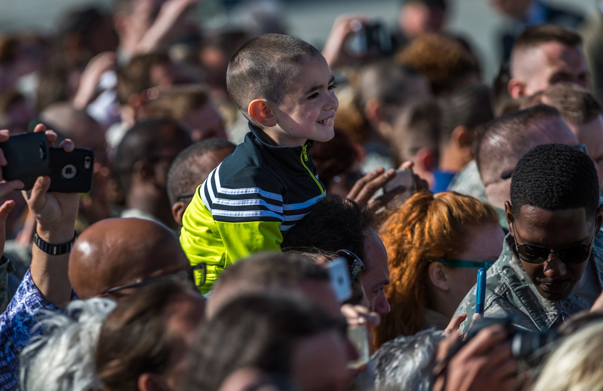 A child watches President Barack Obama disembark Air Force One at Joint Base Elmendorf-Richardson, Alaska, Monday, Aug. 31, 2015. President Obama was the main speaker at a major event yesterday in Anchorage, Alaska, hosted by the U.S. Department of State entitled the Conference on Global Leadership in the Arctic: Cooperation, Innovation, Engagement and Resilience (GLACIER). GLACIER will focus the world’s attention on the most urgent issues facing the Arctic today and provide an unprecedented opportunity for foreign ministers and key stakeholders to define the region’s most crucial challenges; highlight innovative ways in which these challenges can be addressed at the local, national and international levels; and broaden global awareness of the impacts of Arctic climate change.  (U.S. Air Force photo/Justin Connaher)