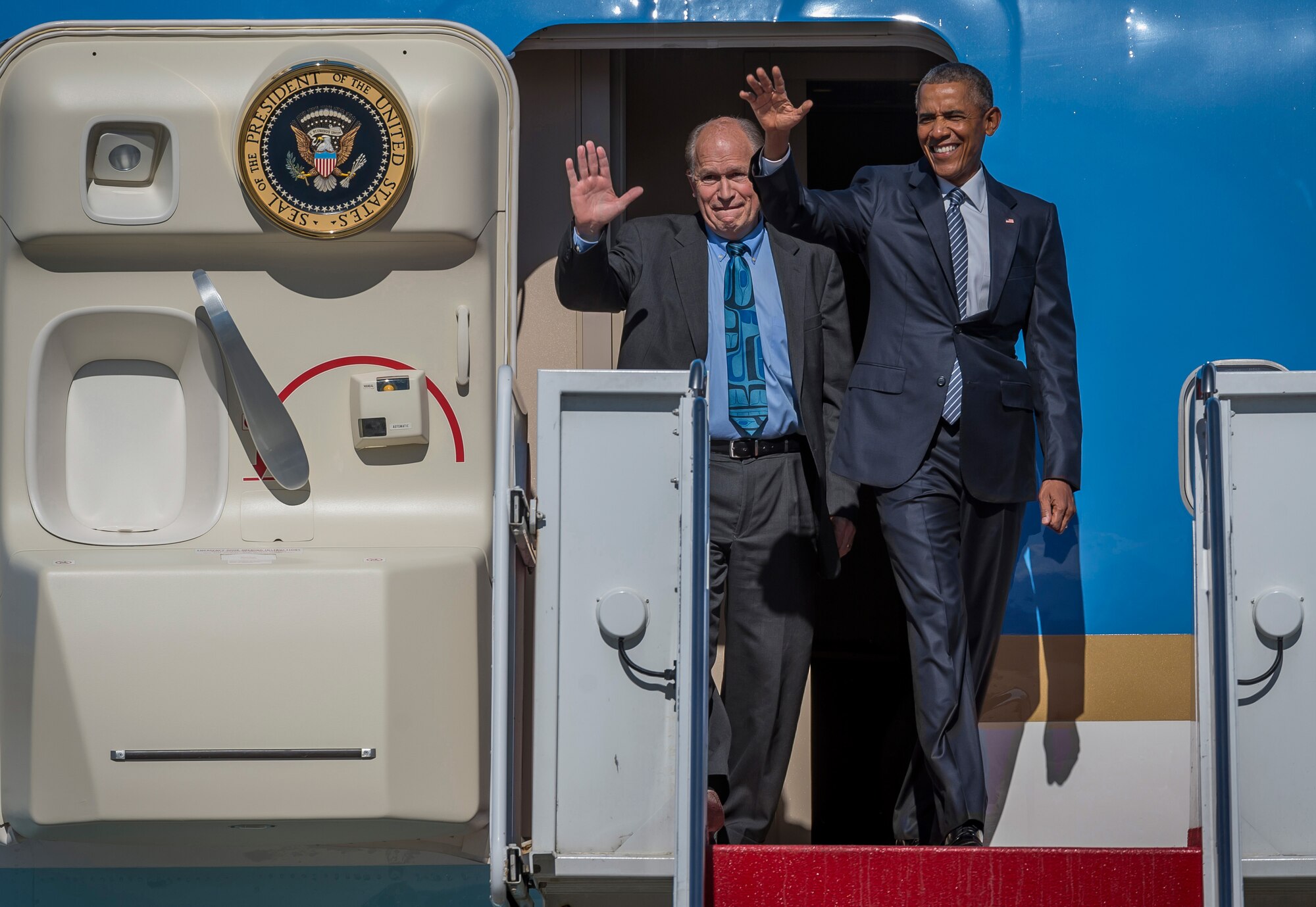 Alaska Gov. Bill Walker, left, and President Barack Obama disembark Air Force One at Joint Base Elmendorf-Richardson, Alaska, Monday, Aug. 31, 2015. President Obama was the main speaker at a major event yesterday in Anchorage, Alaska, hosted by the U.S. Department of State entitled the Conference on Global Leadership in the Arctic: Cooperation, Innovation, Engagement and Resilience (GLACIER). GLACIER will focus the world’s attention on the most urgent issues facing the Arctic today and provide an unprecedented opportunity for foreign ministers and key stakeholders to define the region’s most crucial challenges; highlight innovative ways in which these challenges can be addressed at the local, national and international levels; and broaden global awareness of the impacts of Arctic climate change.  (U.S. Air Force photo/Justin Connaher)