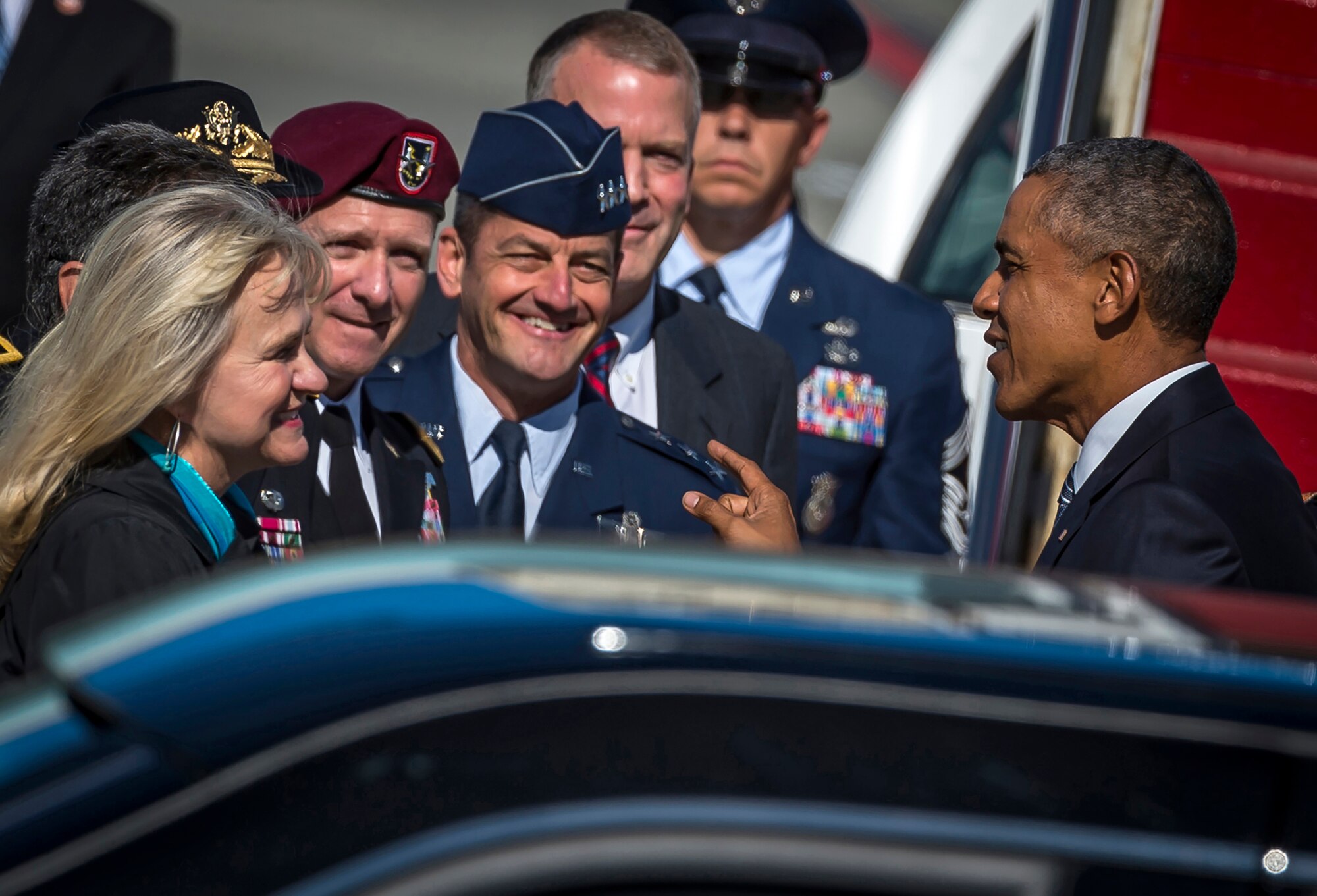President Barack Obama speaks with Joint Base Elmendorf-Richardson military leaders, and Alaska government officials after disembarking Air Force One at JBER, Alaska, Monday, Aug. 31, 2015. President Obama was the main speaker at a major event yesterday in Anchorage, Alaska, hosted by the U.S. Department of State entitled the Conference on Global Leadership in the Arctic: Cooperation, Innovation, Engagement and Resilience (GLACIER). GLACIER will focus the world’s attention on the most urgent issues facing the Arctic today and provide an unprecedented opportunity for foreign ministers and key stakeholders to define the region’s most crucial challenges; highlight innovative ways in which these challenges can be addressed at the local, national and international levels; and broaden global awareness of the impacts of Arctic climate change.  (U.S. Air Force photo/Justin Connaher)