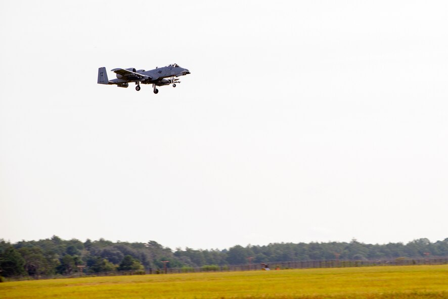 An A-10C Thunderbolt II descends for landing during Forward Aerial Refueling Point training Aug. 28, 2015, at Moody Air Force Base, Ga.  The 23d Logistics Readiness Squadron’s Fuel Management Flight refueled four A-10C Thunderbolt II’s to build efficiency in refueling aircraft in forward operating locations. U.S. Air Force photo by Airman 1st Class Greg Nash/Released)  