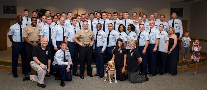 Graduates from a Joint Leaders Course pose for a group photo Aug. 28, 2015, at Joint Base Charleston – Air Base, S.C.  JB Charleston was approved to be the first base to test the new program. The week-long class covered resiliency, leadership and serves to be a all-inclusive healing approach to taking care of ourselves to better take care of others. (U.S. Air Force photo/Airman 1st Class Clayton Cupit)