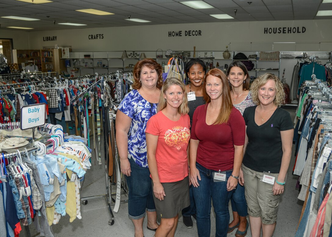 Edwards Officers' Spouses Club members and Thrift Store volunteers are ready to welcome customers after the summer break Sept. 1. Pictured in the front row (left to right), Kara Corbin-Rusnok, Nicole McGowan and Barbie Councell. In the back row (left to right), Linda Wheeler, Thrift Store manager Tiffany Gordon and Anette Munro. (U.S. Air Force photo by Rebecca Amber)
