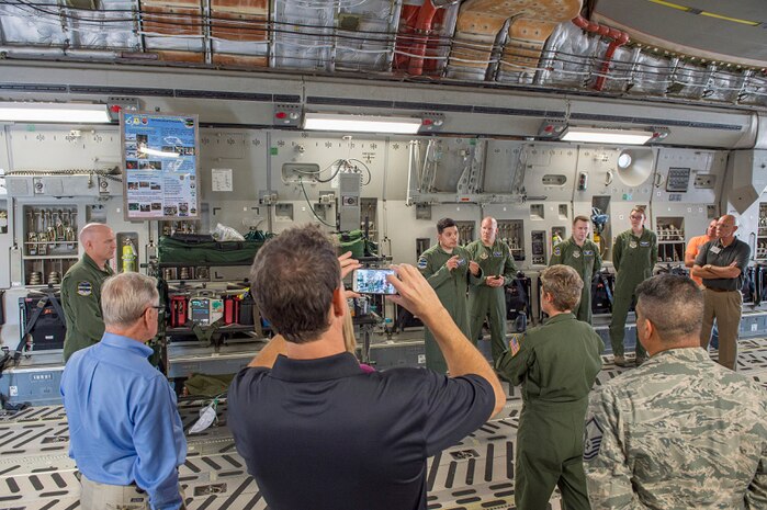 Members of the 315th Aeromedical Evacuation Squadron brief Macdill Air Force Base civic leaders on their medical and operational capabilities inside a C-17 Globemaster III, Aug. 27, 2015, at Joint Base Charleston, S.C. The Macdill Civic Leaders tour was an opportunity to show visiting Honorary Commanders and Advisory Council members the capabilities of JB Charleston. (U.S. Air Force photo/Senior Airman George Goslin) 