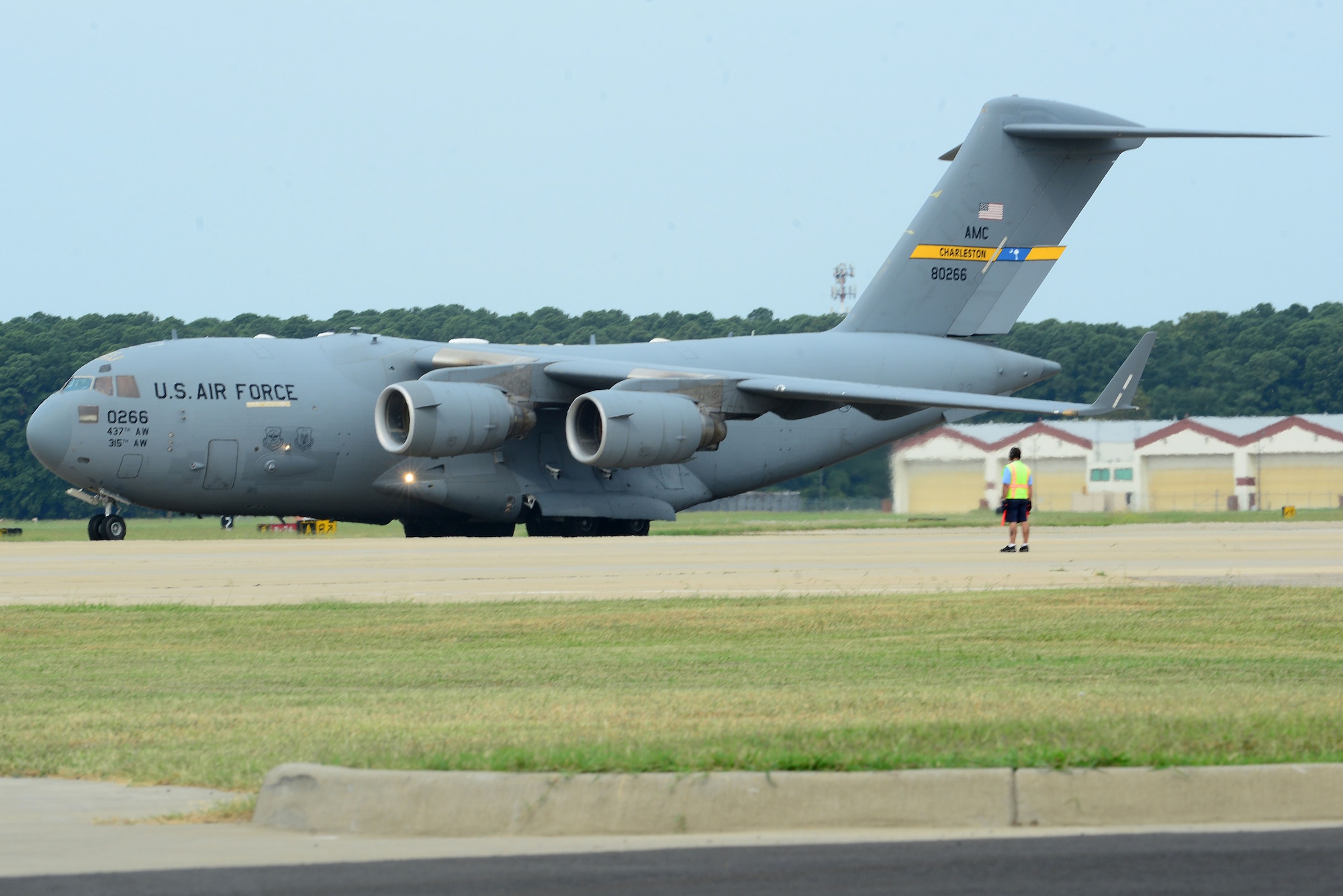 A C-17 Globemaster III from Joint Base Charleston, S.C., lands on the flight line at Langley Air Force Base, Va., Aug. 27, 2015. The aircraft was used as part of a deployment readiness exercise geared toward improving processing procedures through air and ground movement. (U.S. Air Force photo by Senior Airman Kimberly Nagle/Released)