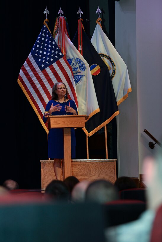 Thursa D. Crittenden, Hampton Roads area community activist and guest speaker, urges the audience to vote at all levels of government during Women’s Equality Observance Aug. 26, 2015, at Fort Eustis, Va. Crittenden went over various points in history that led to women’s right to vote and points thereafter that wouldn’t have been possible without the voting. (U.S. Air Force photo by Staff Sgt. Natasha Stannard/Released)