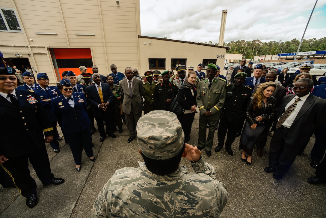 U.S. Air Force Lt. Col. Erwin Gines, 86th Medical Group chief nurse, briefs NATO officers on U.S. Air Force and Army medical evacuation procedures Aug. 25, 2015, at Ramstein Air Base, Germany. More than 60 NATO officers from around the globe attended a medical response demonstration here, which exhibited the U.S. Air Force and Army’s rapid medical and casualty evacuation abilities. (U.S. Air Force photo/Senior Airman Nicole Sikorski)