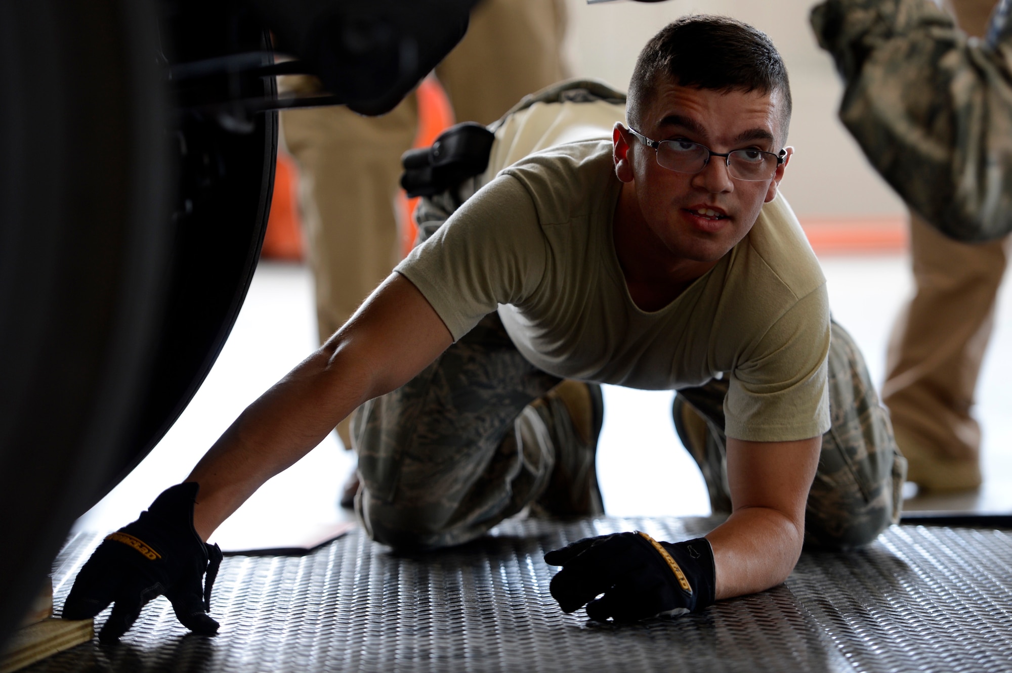 U.S. Air Force Senior Airman Jacob Werdefoff, 633rd Logistics Readiness Squadron joint inspector, measures the height of a vehicle during a Phase I Deployment Readiness Exercise at Langley Air Force Base, Va., Aug. 25, 2015. During the exercise, Airmen inspected cargo before it was uploaded onto a C-17 Globemaster III to ensure weight and height requirements were met. (U.S. Air Force photo by Senior Airman Kayla Newman/Released)