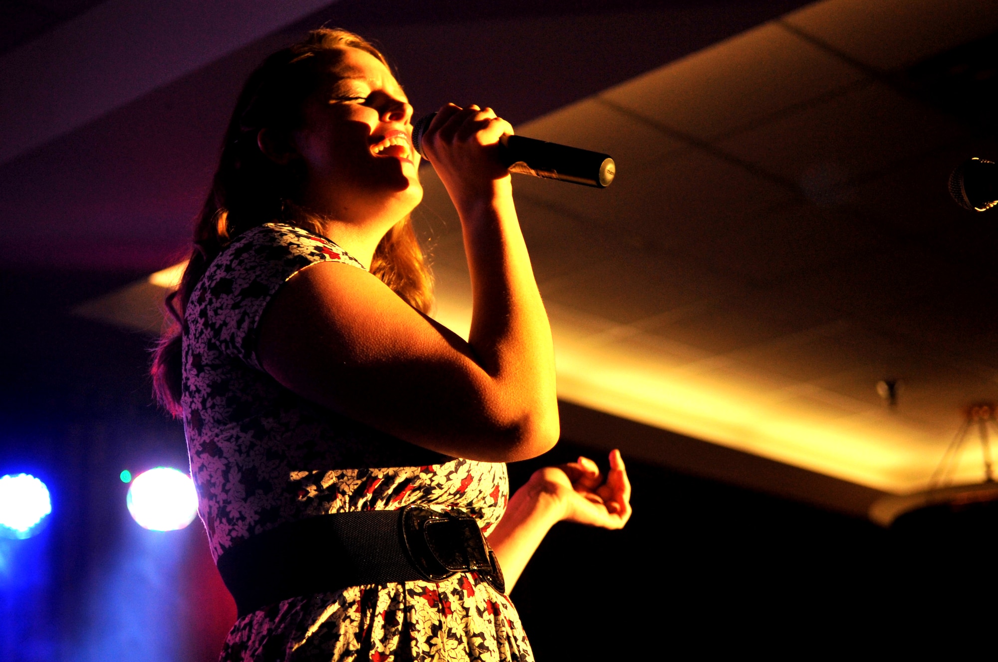 Hannah Brandon performs Etta James’s “At Last” at the AMC Icon competition Aug. 28, 2015 on Grand Forks Air Force Base, North Dakota. Brandon won second place and a $300 cash prize for her performance. (U.S. Air Force photo/Staff Sgt. Susan L. Davis)