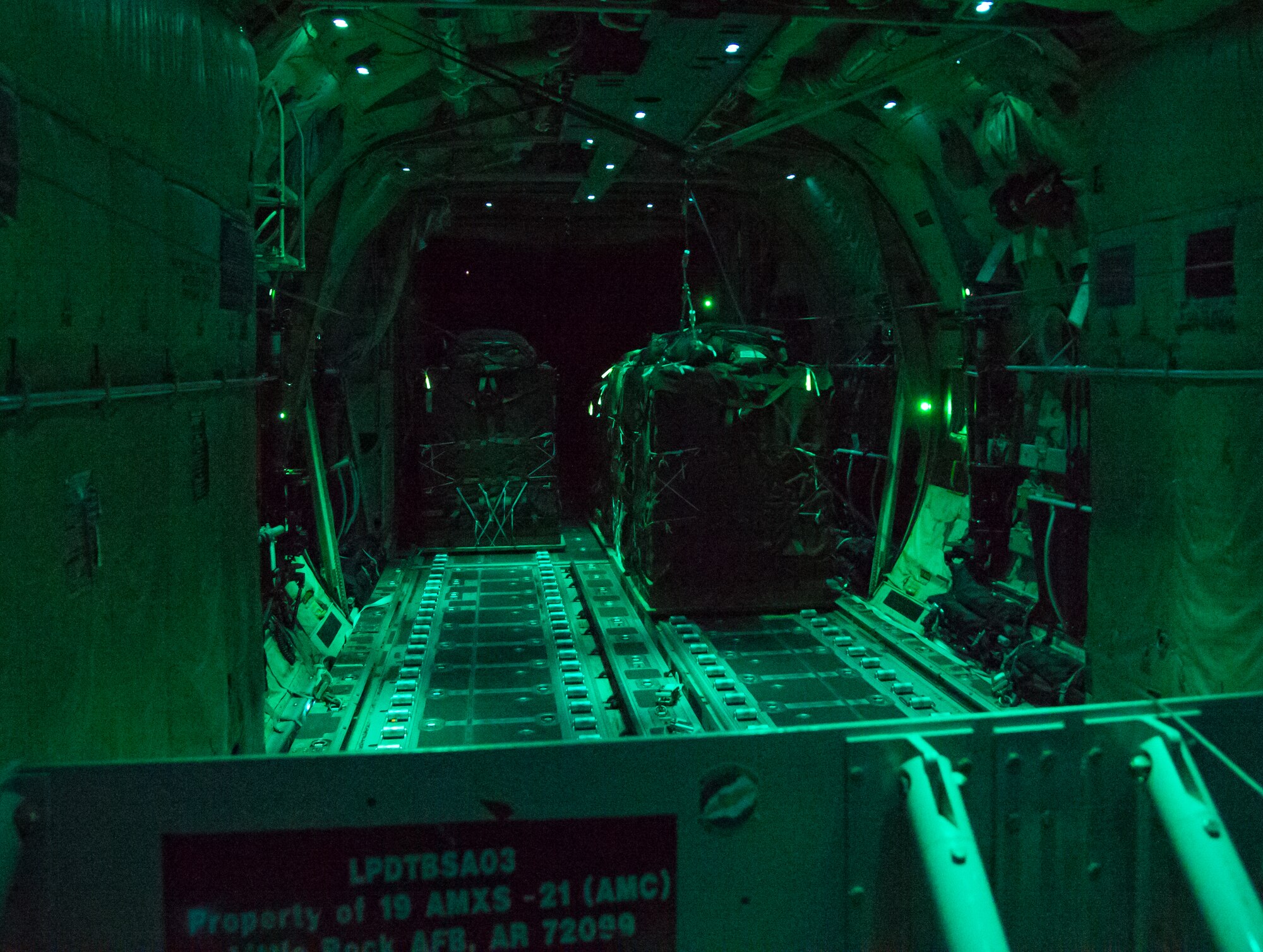 Cargo exits a C-130J Super Hercules Aug. 25, 2015, above Romania as part of exercise Swift Response.  Swift Response is a joint and combined certification training event integrating multinational Brigade Task Forces from 11 NATO nations to include the U.S., Germany, Italy, the United Kingdom and Greece. (U.S. Air Force photo/ Senior Airman Jonathan Stefanko)