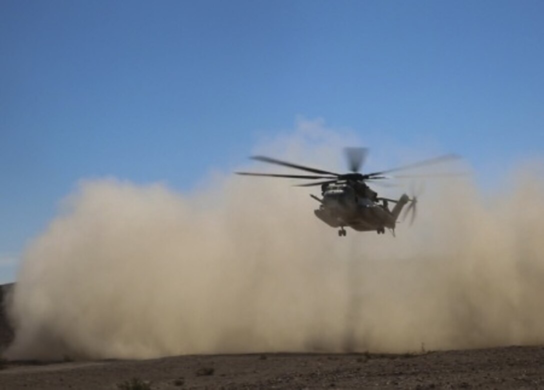 A CH-53E Super Stallion with Marine Heavy Helicopter Squadron 366 descends to a secured landing zone during a simulated casualty evacuation aboard Marine Corps Air Ground Combat Center Twentynine Palms, California, Aug. 10, 2015. The simulation gave Marines with Combat Logistics Battalion 1, Combat Logistics Regiment 1, 1st Marine Logistics Group an opportunity to prepare for casualty response during future operations.
