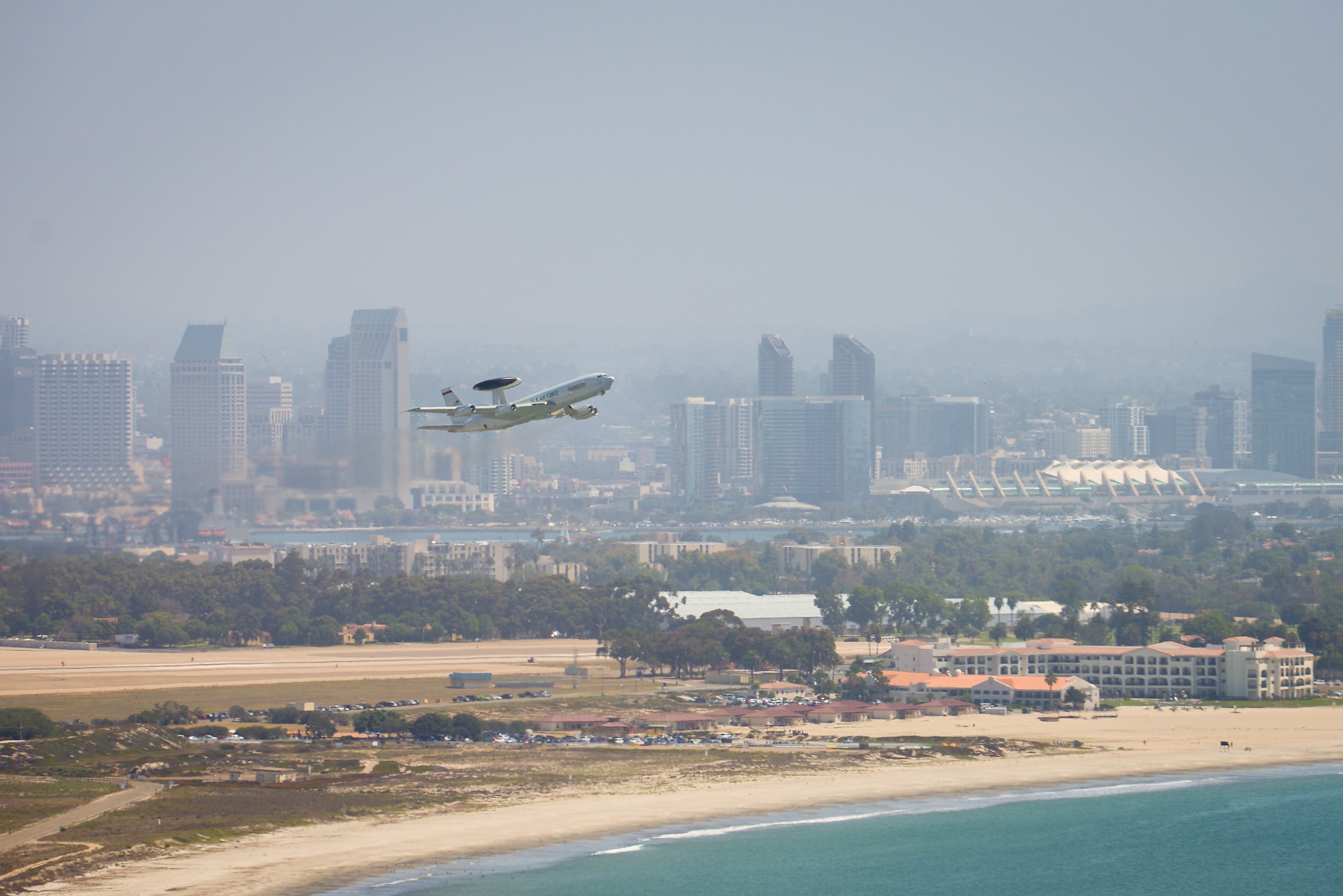 An E-3C Sentry Airborne Warning and Control System aircraft flown by reservists from the 513th Air Control Group takes off on Aug. 24 from Naval Air Station North Island in Coronado, Calif. Maintenance and operations Airmen from the 513th supported naval operations by providing airborne command and control to ships and aircraft during Joint Task Force Exercise 2015. (U.S. Air Force photo by Staff Sgt. Caleb Wanzer)