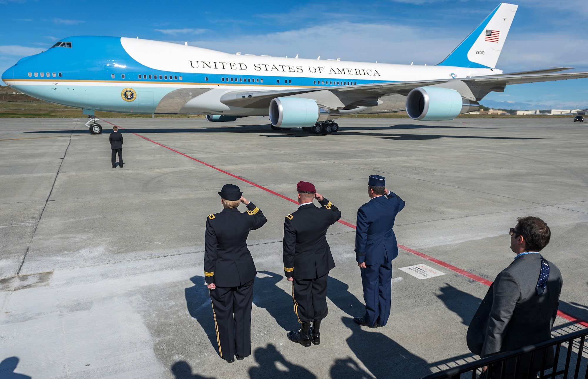 Joint Base Elmendorf-Richardson military leaders salute as President Barack Obama prepares to disembark Air Force One at JBER, Alaska, Monday, Aug. 31, 2015. President Obama was the main speaker at a major event yesterday in Anchorage, Alaska, hosted by the U.S. Department of State entitled the Conference on Global Leadership in the Arctic: Cooperation, Innovation, Engagement and Resilience (GLACIER). GLACIER will focus the world’s attention on the most urgent issues facing the Arctic today and provide an unprecedented opportunity for foreign ministers and key stakeholders to define the region’s most crucial challenges; highlight innovative ways in which these challenges can be addressed at the local, national and international levels; and broaden global awareness of the impacts of Arctic climate change.  (U.S. Air Force photo/Justin Connaher)